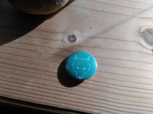 Button mit Wolfskopf